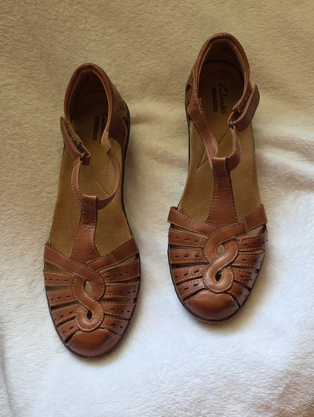 Clarks Tan Leather T‑Strap Sandals with Decorative Cutouts